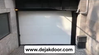 نصب حرفه‌ای درب اتوماتیک پارکینگ سکشنال با برند BFT توسط شرکت دژآک